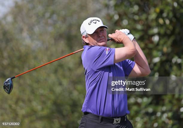 Lee Janzen watches his tee shot on the 18th hole during the first round of the Rapiscan Systems Classic at Fallen Oak Golf Course on March 23, 2018...