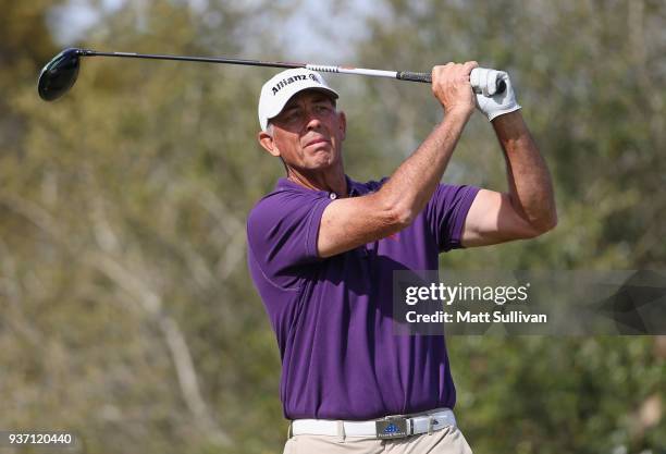 Tom Lehman watches his tee shot on the 18th hole during the first round of the Rapiscan Systems Classic at Fallen Oak Golf Course on March 23, 2018...