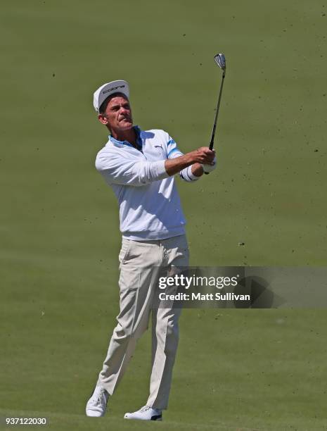 Jesper Parnevik of Sweden hits his second shot on the first hole during the first round of the Rapiscan Systems Classic at Fallen Oak Golf Course on...