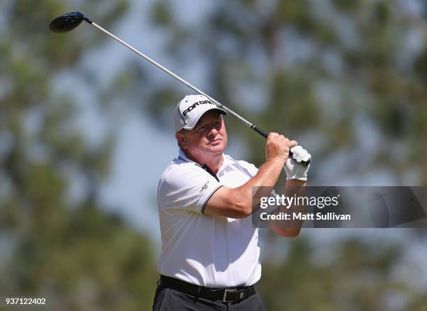 Ian Woosnam watches his tee shot on the second hole during the first round of the Rapiscan Systems Classic at Fallen Oak Golf Course on March 23,...