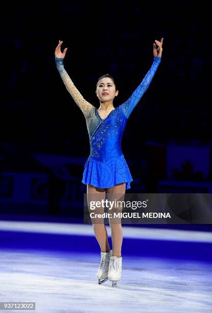 Bronze medal Satoko Miyahara from Japan poses ahead of the podium ceremony for the Ladies-Free Skate program at the Milano World Figure Skating...