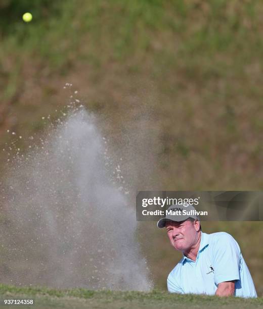 Joe Durant hits his third shot on the 18th hole during the first round of the Rapiscan Systems Classic at Fallen Oak Golf Course on March 23, 2018 in...