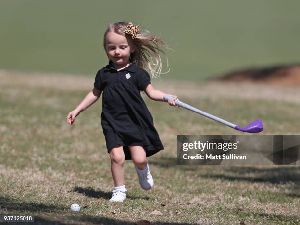 Camryn Ledet chases her ball while playing with her family during the first round of the Rapiscan Systems Classic at Fallen Oak Golf Course on March...