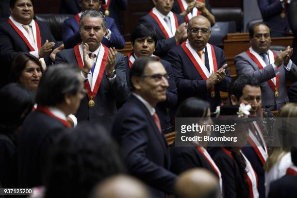 Congressman applaud during Martin Vizcarra, Peru's president, center, swearing in ceremony in Lima, Peru, on Friday, March 23, 2018. Vizcarra assumed...