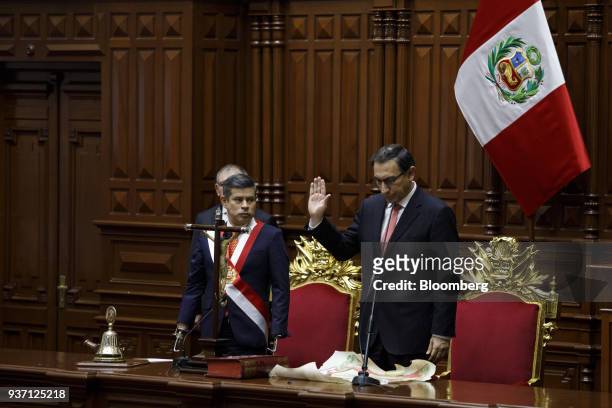 Martin Vizcarra, Peru's president, right, swears into office during a ceremony in Lima, Peru, on Friday, March 23, 2018. Vizcarra assumed Peru's...