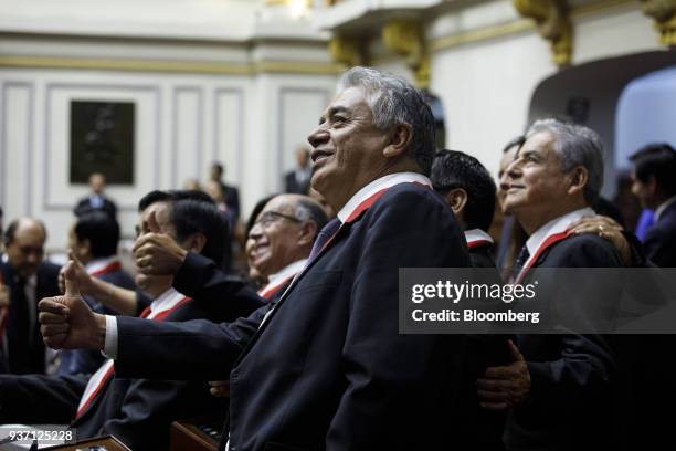 Congressman react during Martin Vizcarra, Peru's president, not pictured, swearing in ceremony in Lima, Peru, on Friday, March 23, 2018....