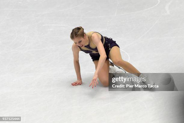 Carolina Kostner of Italy falls down in women free skating during day three of the World Figure Skating Championships at Mediolanum Forum on March...