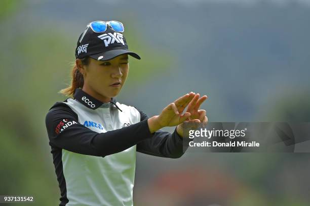 Lydia Ko of New Zealand lines up her putt on the 4th green during Round Two of the LPGA KIA CLASSIC at the Park Hyatt Aviara golf course on March 23,...