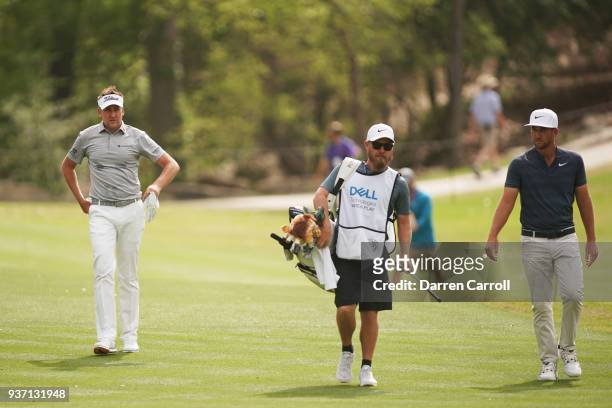 Ian Poulter of England and Kevin Chappell of the United States walk on the eighth hole during the third round of the World Golf Championships-Dell...