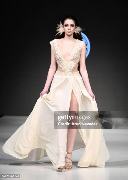 Model walks the runway wearing King & Reign at 2018 Vancouver Fashion Week - Day 3 on March 21, 2018 in Vancouver, Canada.