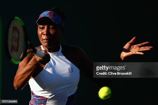 Venus Williams of the United States plays a forehand against Natalia Vikhlyantseva of Russia in their second round match during the Miami Open...
