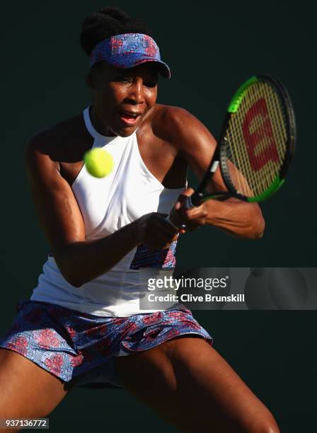 Venus Williams of the United States plays a backhand against Natalia Vikhlyantseva of Russia in their second round match during the Miami Open...