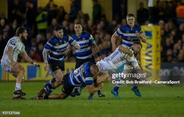 Exeter Chiefs' Sam Hill is tackled by Bath Rugby's Jonathan Joseph during the Aviva Premiership match between Bath Rugby and Exeter Chiefs at...