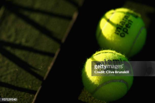 Miami Open logo used tennis balls at the side of the court during the Miami Open Presented by Itau at Crandon Park Tennis Center on March 23, 2018 in...