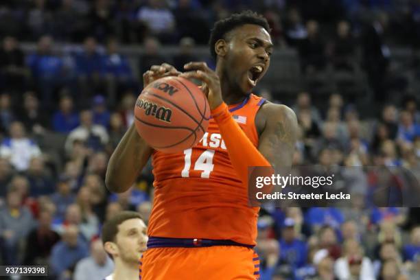 Elijah Thomas of the Clemson Tigers dunks the ball against the Kansas Jayhawks during the first half in the 2018 NCAA Men's Basketball Tournament...