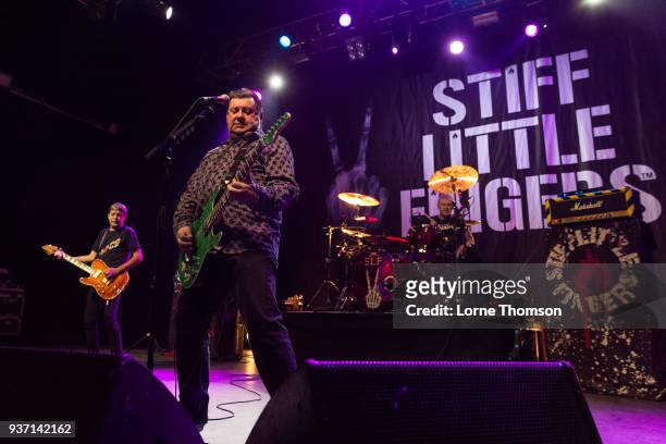 Ian McCallum, Jake Burns and Steve Grantley of Stiff Little Fingers perform at The Forum on March 23, 2018 in London, England.