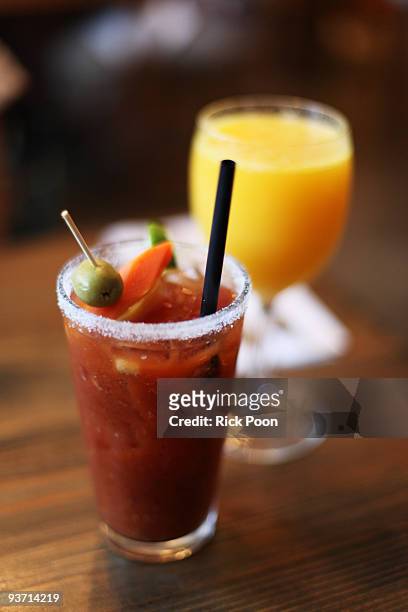 bloody mary and orange juice - bloody mary stock pictures, royalty-free photos & images