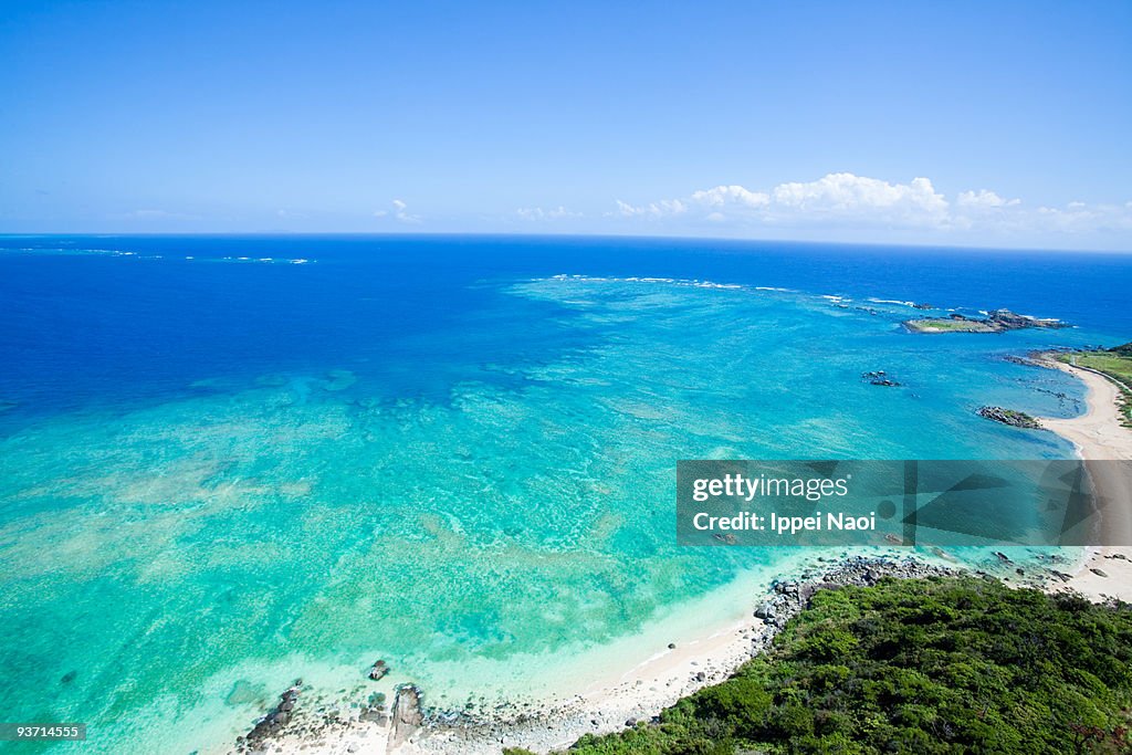Tropical island and coral reef from above, Okinawa