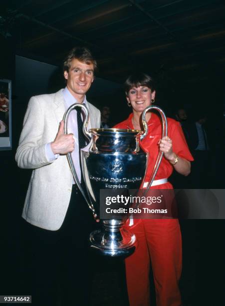 Liverpool captain Phil Thompson and his fiancee Margi with the trophy after the European Cup Final between Liverpool and Real Madrid held at the Parc...