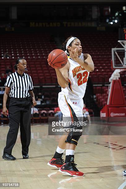 Kim Rodgers of the Maryland Terrapins passes the ball against the New Hampshire Wildcats at the Comcast Center on November 16, 2009 in College Park,...