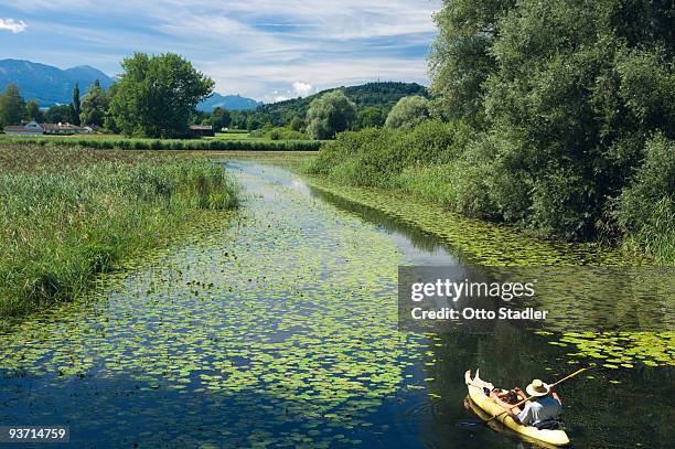 canoeing in nature, bavaria - chiemsee stock-fotos und bilder
