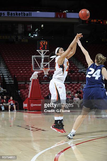 Kim Rodgers of the Maryland Terrapins shoots a jump shot against the New Hampshire Wildcats at the Comcast Center on November 16, 2009 in College...