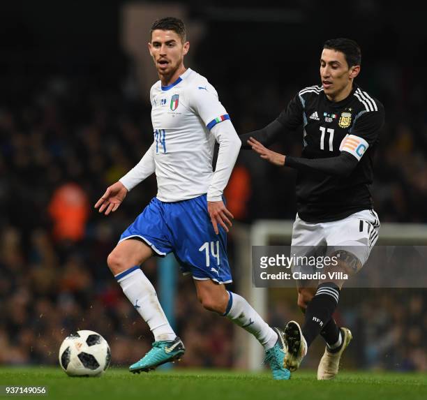 Jorginho of Italy and Angel Di Maria compete for the ball during the International Friendly between Argentina and Italy at Etihad Stadium on March...
