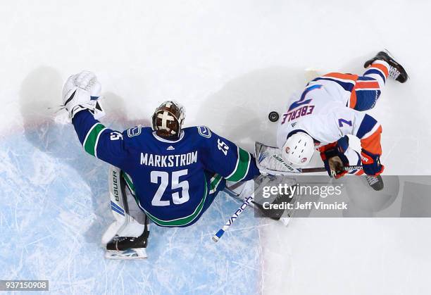 Jacob Markstrom of the Vancouver Canucks makes a save off the shot of Jordan Eberle of the New York Islanders during their NHL game at Rogers Arena...