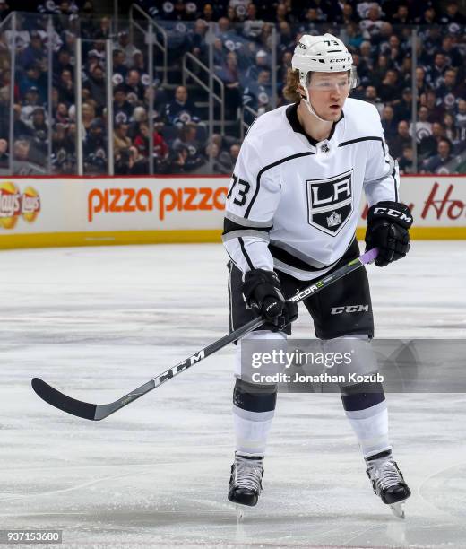 Tyler Toffoli of the Los Angeles Kings keeps an eye on the play during first period action against the Winnipeg Jets at the Bell MTS Place on March...