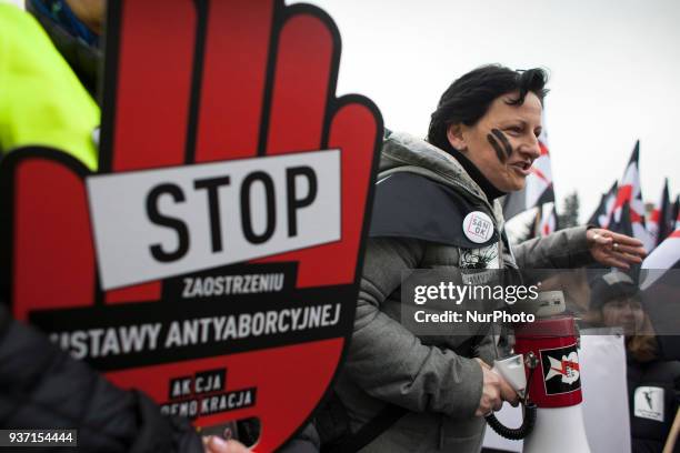 Feminist during strike against restrictions in Abortion Law in Warsaw on March 23, 2018.