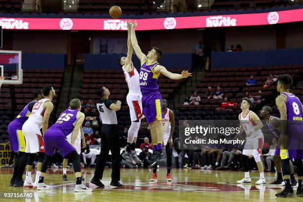 Chance Comanche of the Memphis Hustle reaches for the opening tip-off against the South Bay Lakers during a NBA G-League game on March 23, 2018 at...