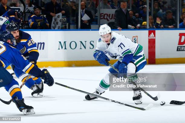 Nikolay Goldobin of the Vancouver Canucks looses control of the puck against the St. Louis Blues at Scottrade Center on March 23, 2018 in St. Louis,...