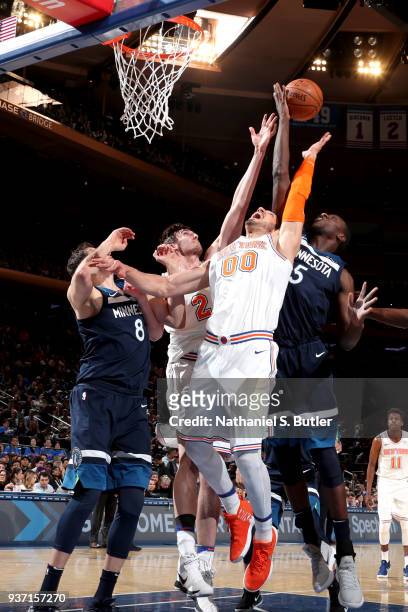 Enes Kanter of the New York Knicks and Gorge Dieng of the Minnesota Timberwolves jump for the rebound on March 23, 2018 at Madison Square Garden in...