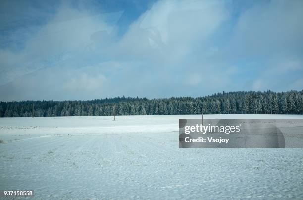 plain, driving in snow on a sunny day, austria - vsojoy stock pictures, royalty-free photos & images