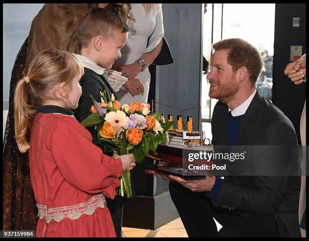 Prince Harry and Meghan Markle visit the Titanic Belfast on March 23, 2018 in Belfast, Nothern Ireland.