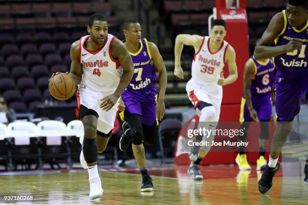 Myke Henry of the Memphis Hustle dribbles the ball during the game against the South Bay Lakers during a NBA G-League game on March 23, 2018 at...