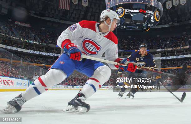 Nikita Scherbak of the Montreal Canadiens skates against Nicholas Baptiste of the Buffalo Sabres during an NHL game on March 23, 2018 at KeyBank...