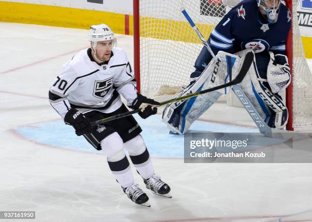 Tanner Pearson of the Los Angeles Kings keeps an eye on the play during third period action against the Winnipeg Jets at the Bell MTS Place on March...