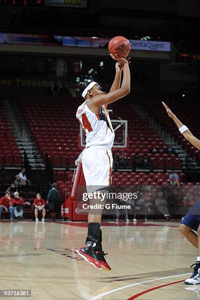 Diandra Tchatchouang of the Maryland Terrapins shoots a jump shot against the New Hampshire Wildcats at the Comcast Center on November 16, 2009 in...