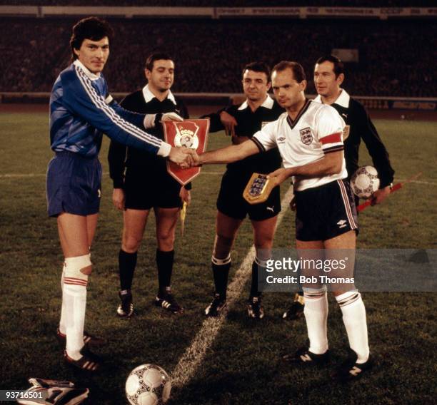 England captain Ray Wilkins shakes hands with Russia captain Rinat Dasaev before their International Friendly match held in Tbilisi, Russia on 26th...