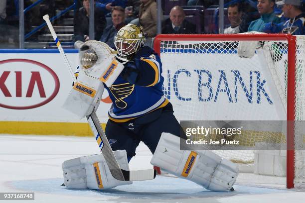 Jake Allen of the St. Louis Blues makes a save on a shot from the Vancouver Canucks at Scottrade Center on March 23, 2018 in St. Louis, Missouri.