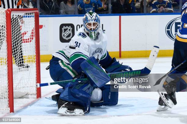 Anders Nilsson of the Vancouver Canucks makes a save against the St. Louis Blues at Scottrade Center on March 23, 2018 in St. Louis, Missouri.