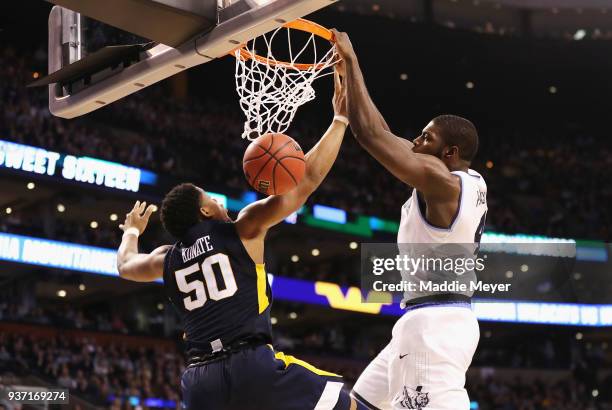 Eric Paschall of the Villanova Wildcats dunks the ball against Sagaba Konate of the West Virginia Mountaineers during the second half in the 2018...
