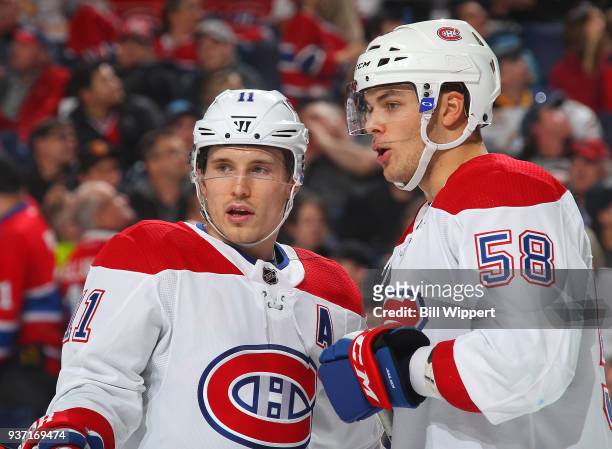 Brendan Gallagher and Noah Juulsen of the Montreal Canadiens chat during an NHL game against the Buffalo Sabres on March 23, 2018 at KeyBank Center...
