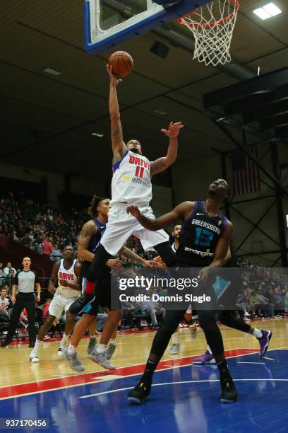 McDaniels of the Grand Rapids Drive drives to the basket during the game against the Greensboro Swarm at the DeltaPlex Arena on March 23, 2018 in...