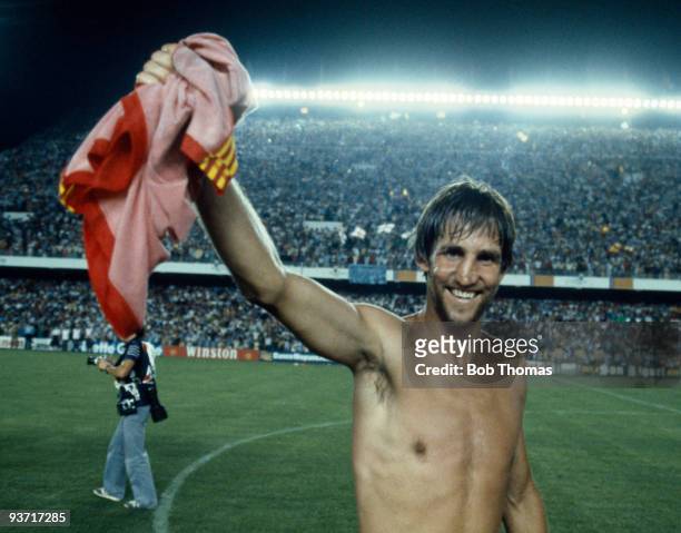 Chris Nicholl of Northern Ireland waves a Spanish shirt after their historic win in the Northern Ireland v Spain World Cup Finals held in Valencia,...