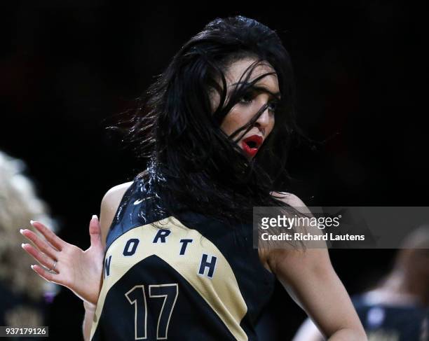 March 23 In second half action, a member of the Raptors Dance Pack continues with a face full of hair. The Toronto Raptors beat the Brooklyn Nets...