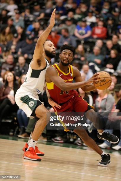 Isaac Hamilton of the Canton Charge jocks for a position against the Wisconsin Herd during the NBA G-League game on March 23, 2018 at the Menominee...