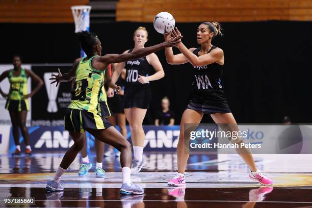 Grace Kara of the Silver Ferns passes the ball during the Taini Jamison Trophy match between New Zealand and Jamaica at North Shore Events Centre on...