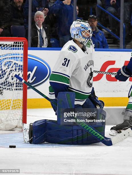 Vancouver Canucks goalie Anders Nilsson reacts after giving up a short-handed goal in the second period during a NHL game between the Vancouver...